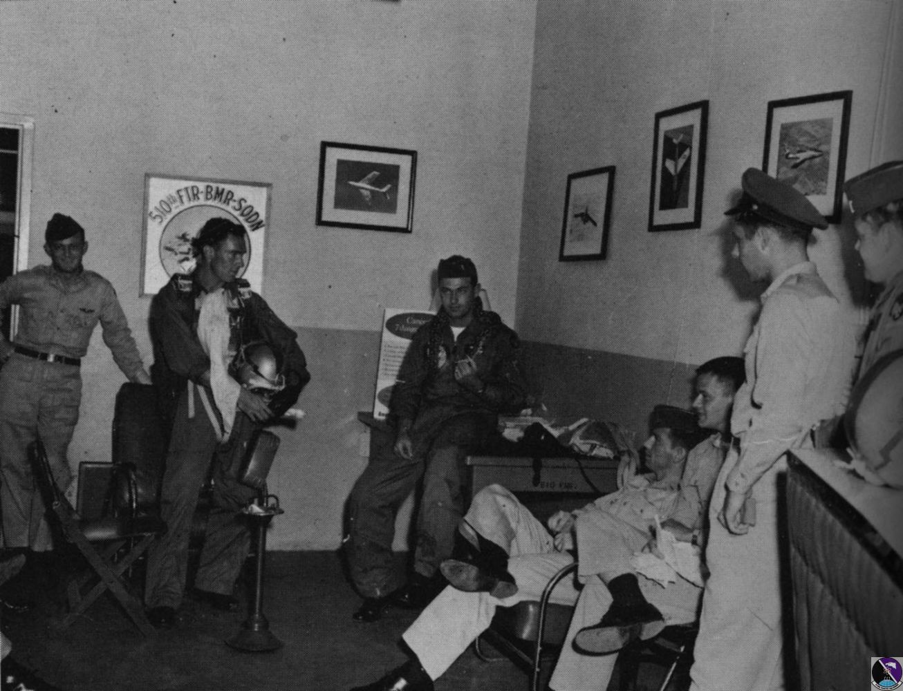 pilots of the 510th awaiting flight in pilot lounge